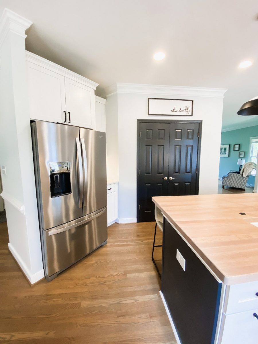 ELIASON KITCHEN COMPLETE - Pantry door and french door fridge in build-in cabinet